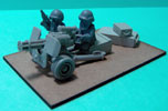 olleys armies scrunt gun crew shown with maxmini gun
